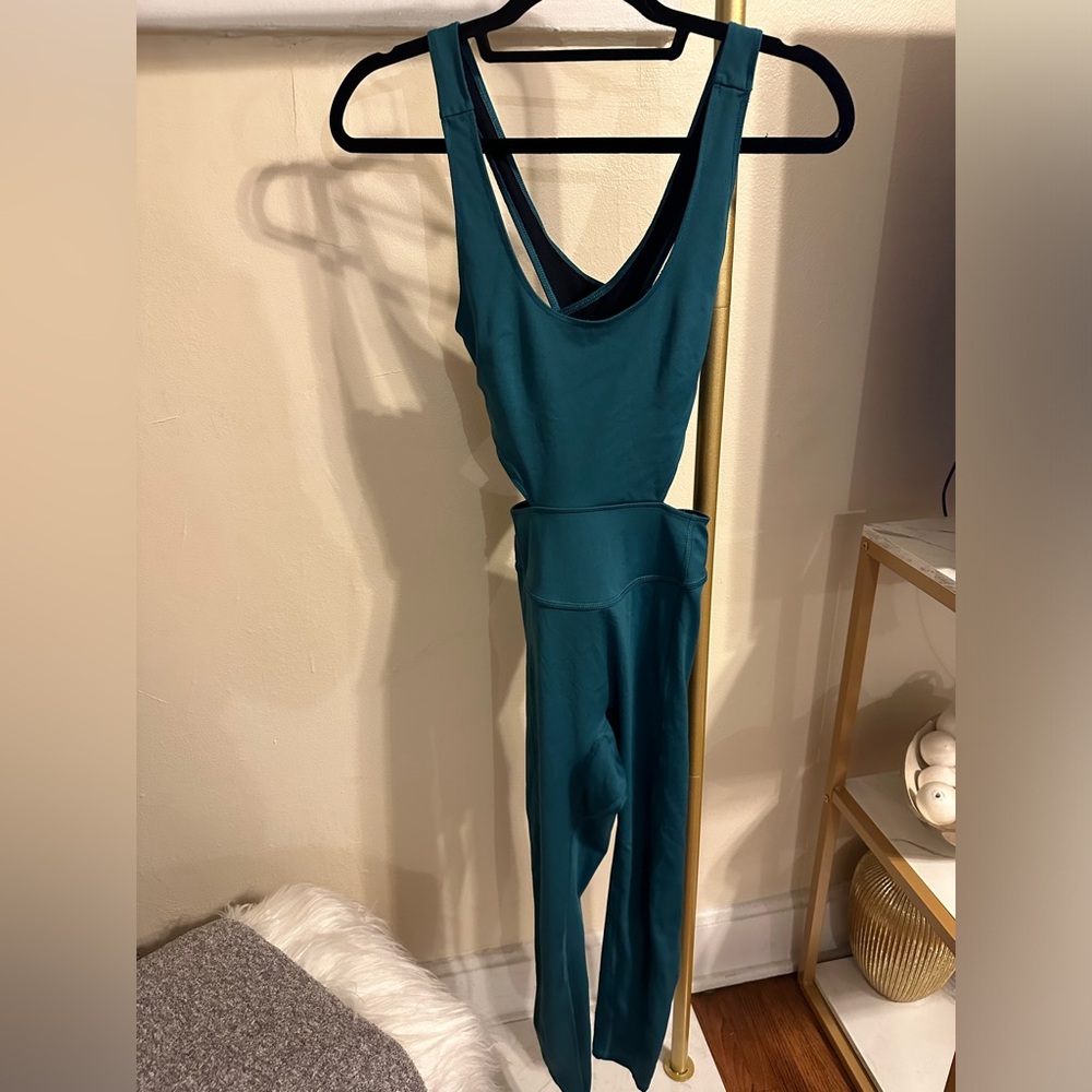 Dark green free people cross back yoga jumpsuit size small